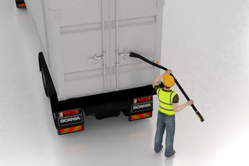 Worker using the OPNBar Overhead Leverage Bar on a high container door handle